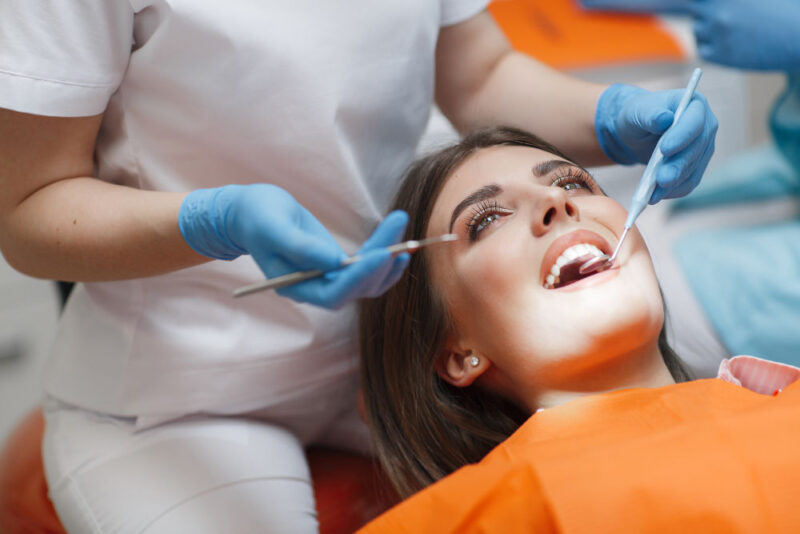 bigstock-Dental-Clinic-Reception-Exam-298903084